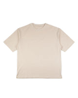 La Beige Tee de VAQUERO VAQUERA, una playera unisex de manga corta en color beige, se muestra extendida sobre fondo blanco, destacando su diseño clásico vaquero.