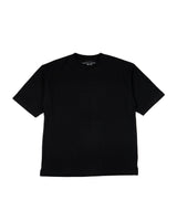 La Negro Tee de VAQUERO VAQUERA es una playera ligera unisex, negra, de manga corta y cuello redondo, sin logotipos ni diseños visibles, dispuesta sobre fondo blanco.